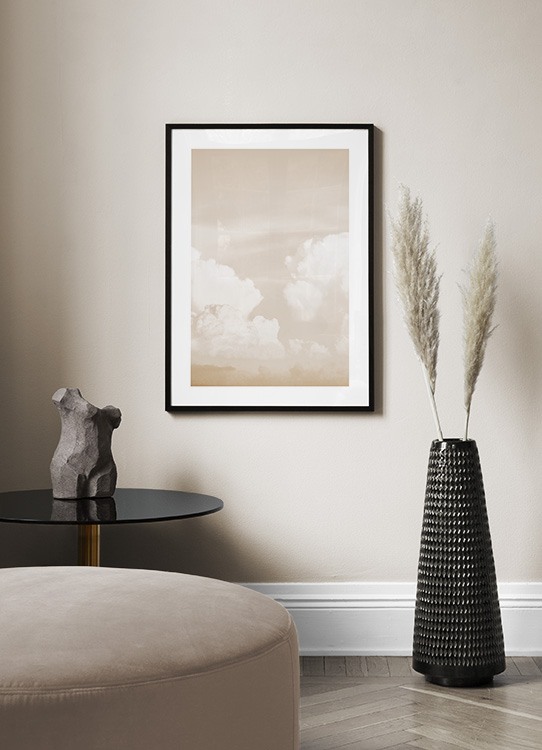  - Photograph of clouds in a peach coloured sky with a pastel finish