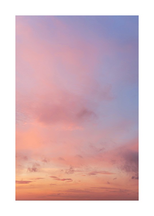  – Photograph of a sunset with pink clouds against a light purple sky