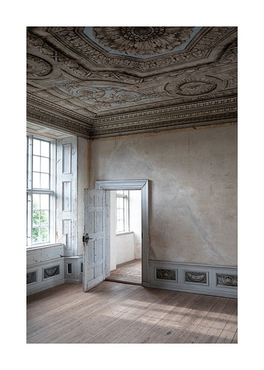  – Photograph of a baroque room with beige walls and a white, open door