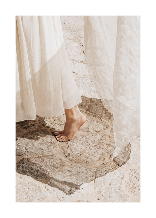  – Image of a girl walking barefoot in a white summer dress